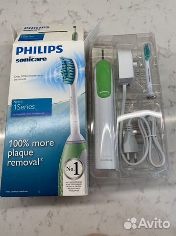 Электрическая зубная щетка