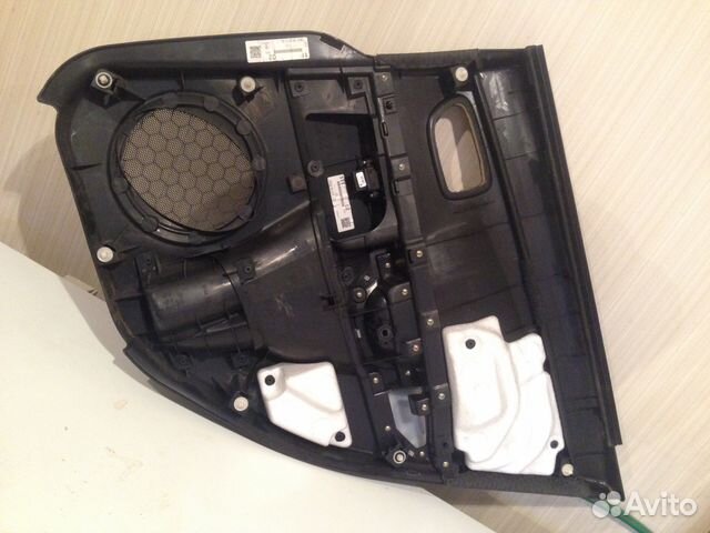 Обивка задней левой двери Мазда 3 2008г. седан