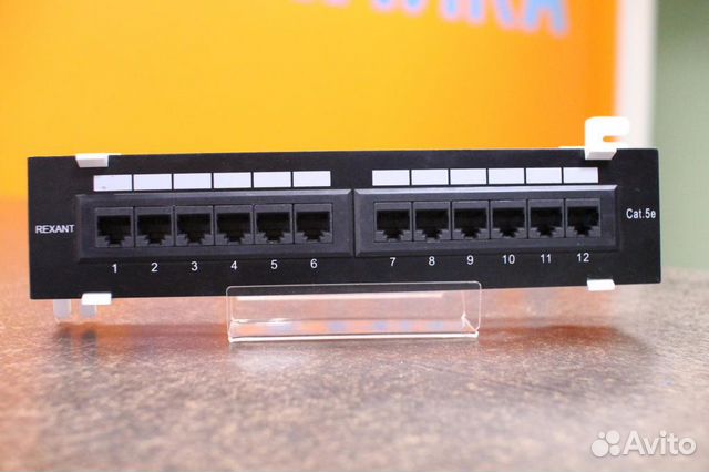 Патч-панель netlan настенная 12*RJ-45 Cat.5e