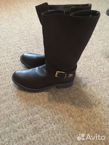 Новые кожаные сапоги