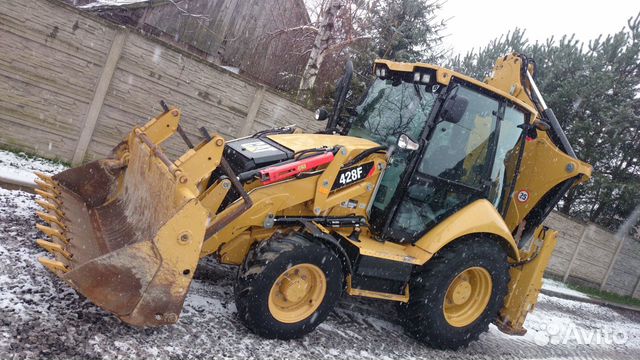 Аренда экскаватора-погрузчика CAT