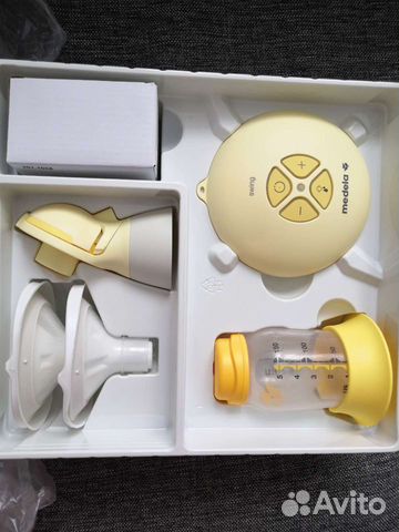 Молокоотсос medela электрический