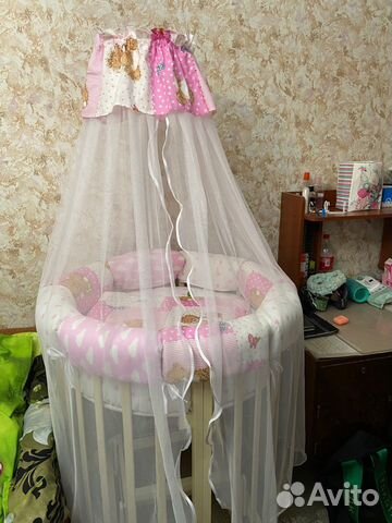 Детская овальная кроватка с маятником