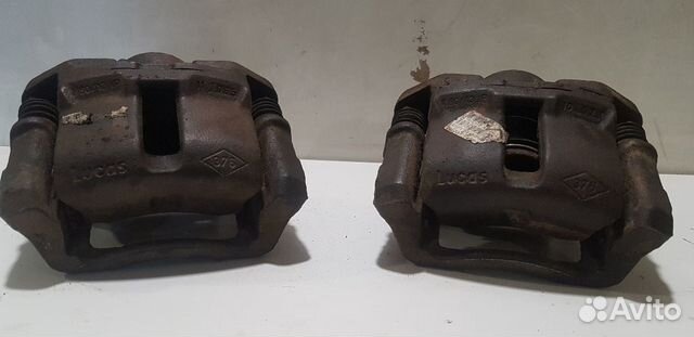 Суппорт передний левый Рено Логан