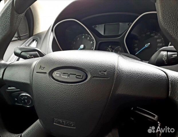 Наклейки на эмблемы черные Ford Focus