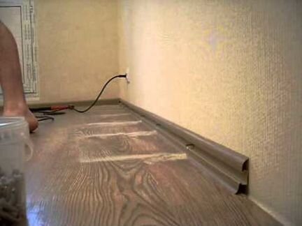 Укладка линолеума,установка плинтусов