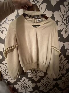 Вельветовая кофта с пумпонами