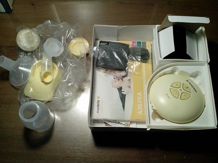 Молокоотсос medela swing электрический